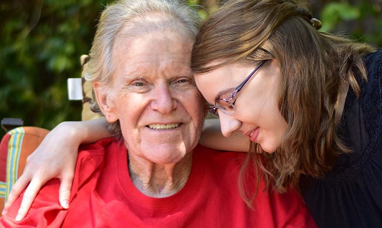 College volunteer visiting a patient