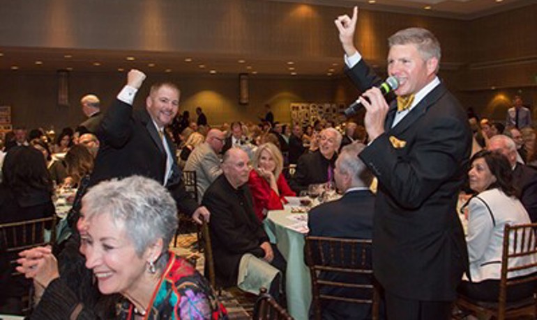 Attendees at the live auction
