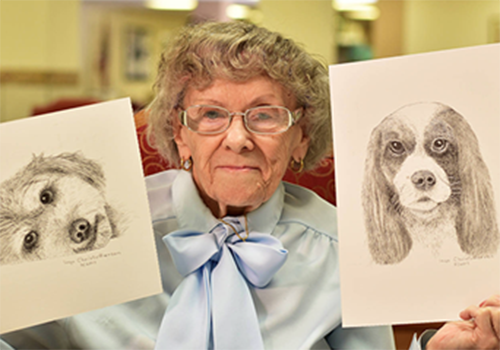 Patient, Inga's showing her dog artwork
