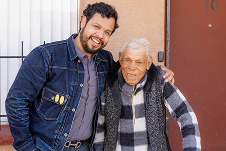 Volunteer Brian Robles and patient Jacobo Dieppa