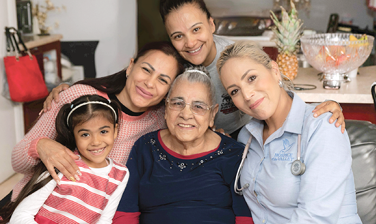 Isidora Dominguez enjoys some quality time with daughters Gladis and Lorena, granddaughter Yutzaley and nurse Erica Coronado. 