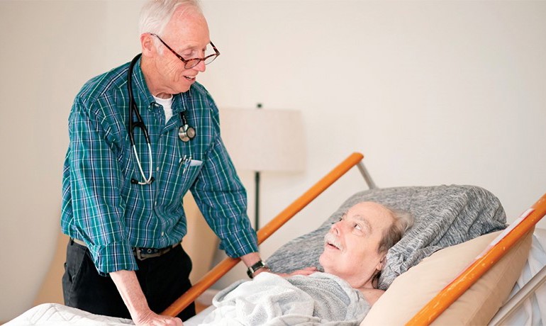 Dr. John Williams with patient