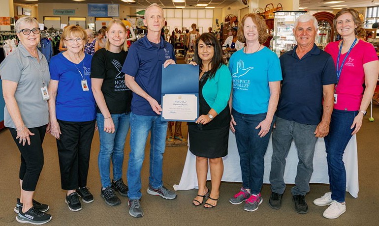 sales associates Judy Hackett and Sandy Milder, Assistant Manager Erin Wirta, Manager Mike Baumann, Lesko’s Outreach Director Monica Yelin, and sales associates Sharron DuPlantis, Eusebio Medina and Chelsea Sheriff pose together with award