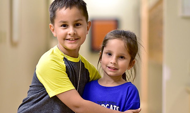 New Song Center children hugging