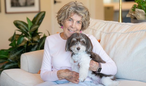 Pet therapy volunteer Nancy Kelso with her pet Coco Chanel.